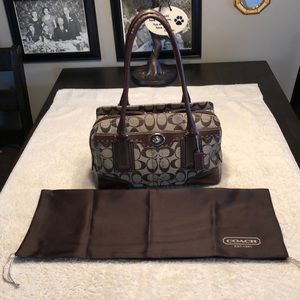 Brown and beige coach purse.